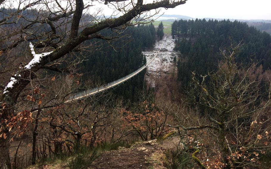 After a mile-long walk, hikers get their first glimpse of the suspension bridge near Moersdorf, Germany. The quarter-mile-long bridge was opened to the public in October 2015.