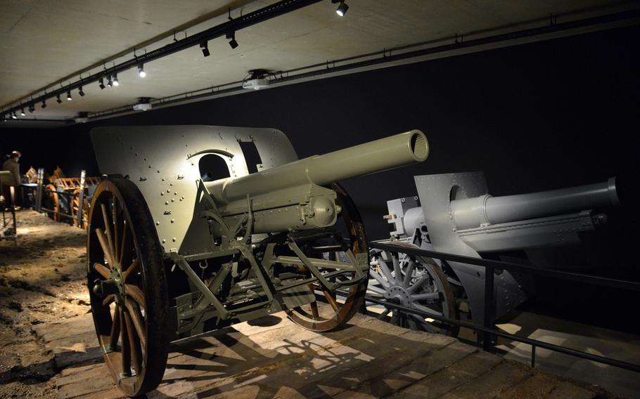 Artillery on display at the Verdun Memorial Museum. Artillery played a major role in the World War I Battle of Verdun. At left is a German 10.5 cm field howitzer, at right a French 155mm C gun short-muzzle howitzer.