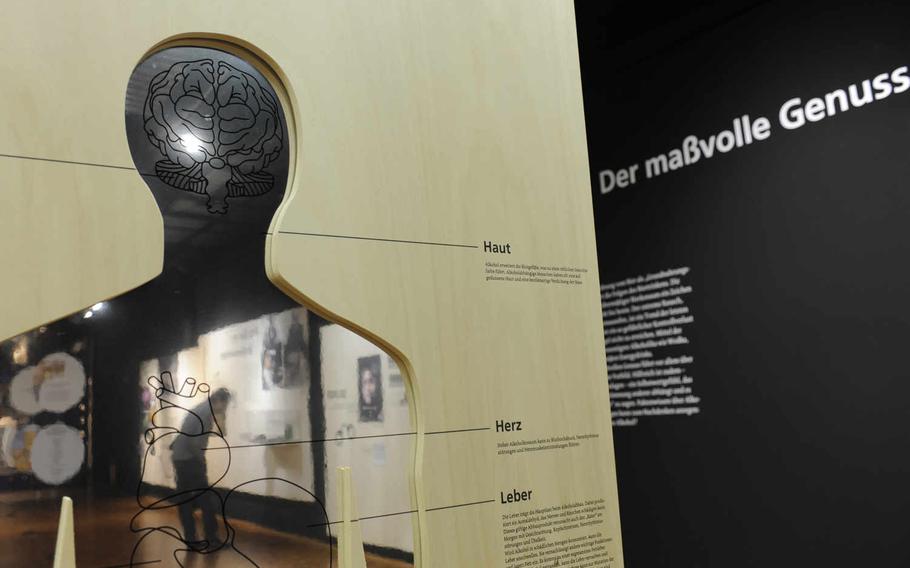 An exhibit on beer and the brewers' art at Mannheim Technoseum doesn't shy away from the dark side of Germany's favorite beverage. This display highlights the health hazards, including swollen skin, high blood pressure and liver damage. The heading in the background - "Der massvolle Genuss" - may be translated as "Pleasure in measure."

