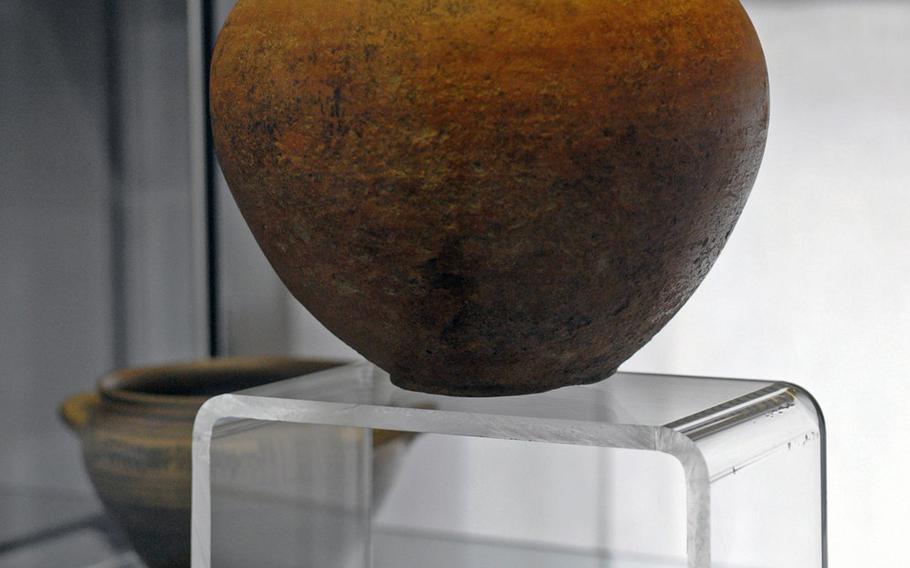 An eight-century B.C. water jug taken from one of the tombs excavated at the site of the U.S. Navy base in Gricignano, Italy, is displayed at the Archeological Museum of Agro Atellano in nearby Succivo.