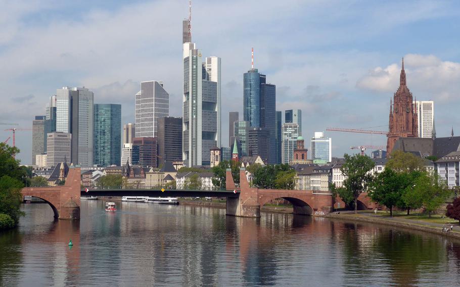 A view of the Frankfurt skyline from one of the bridges spanning the Main River. At center is the Commerzbank Tower. At about 850 feet, it is the second tallest building in Europe after The Shard in London. At right is the Dom, Frankfurt's cathedral. 