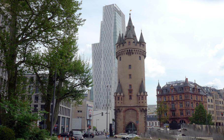 The Eschenheimer Tor was once part of Frankfurt's medieval fortifications that surrounded the city. A major trading road once ran through its gates. Behind it is the modern 443 foot-tall Nextower.