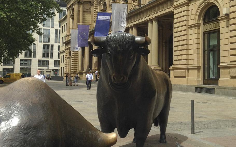 Statues of a bull and bear outside the Frankfurt Stock Exchange. Frankfurt, Germany, has a long history as a financial capital because of its central location in Europe.