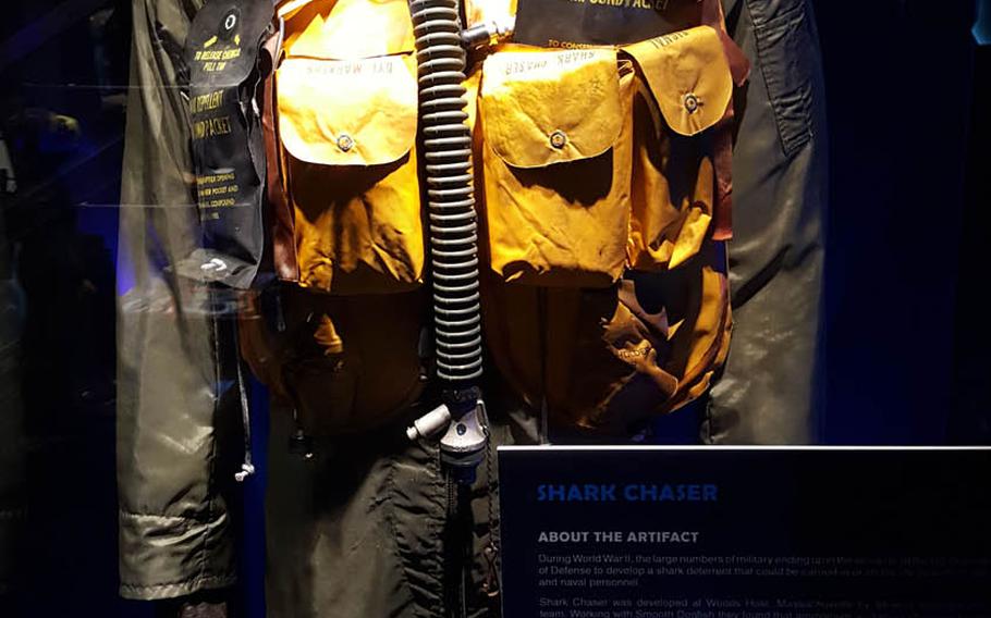 During World War II and for 30 years after, U.S. airmen and sailors were issued Shark Chaser with their lifejackets, as seen here in the black packets in this jumpsuit displayed at Planet Shark: Predator or Prey. Its effectiveness was dubious.