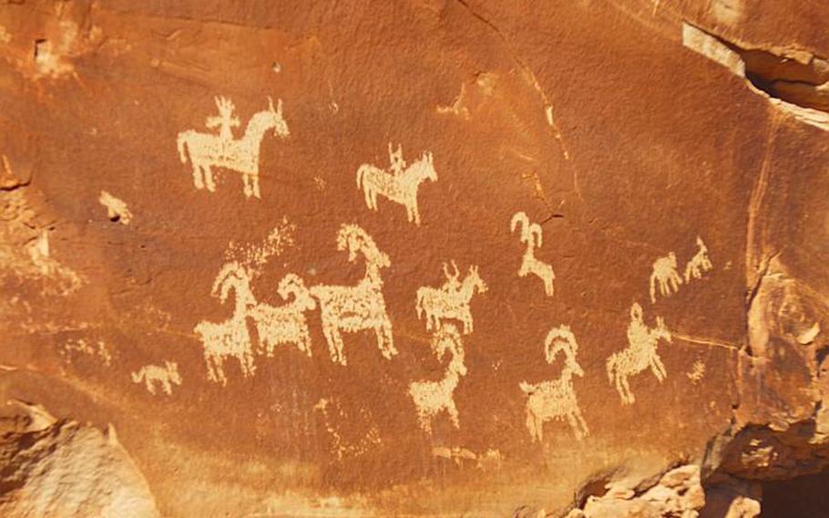 Along the trail to Delicate Arch, visitors can see petroglyphs dating to when the Ute tribe - for which Utah is named - roamed the region. Photo by Elizabeth Zach for The Washington Post