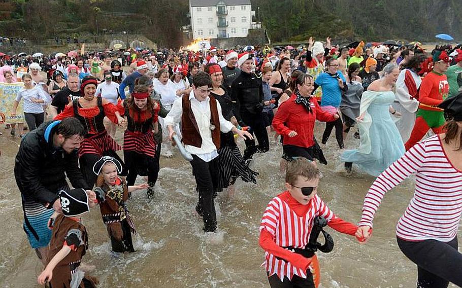 At 11 a.m. on Dec. 26, hundreds of brave swimmers take to the frigid waters of North Beach, Tenby, Pembrokeshire, Wales to raise money for their favorite causes.