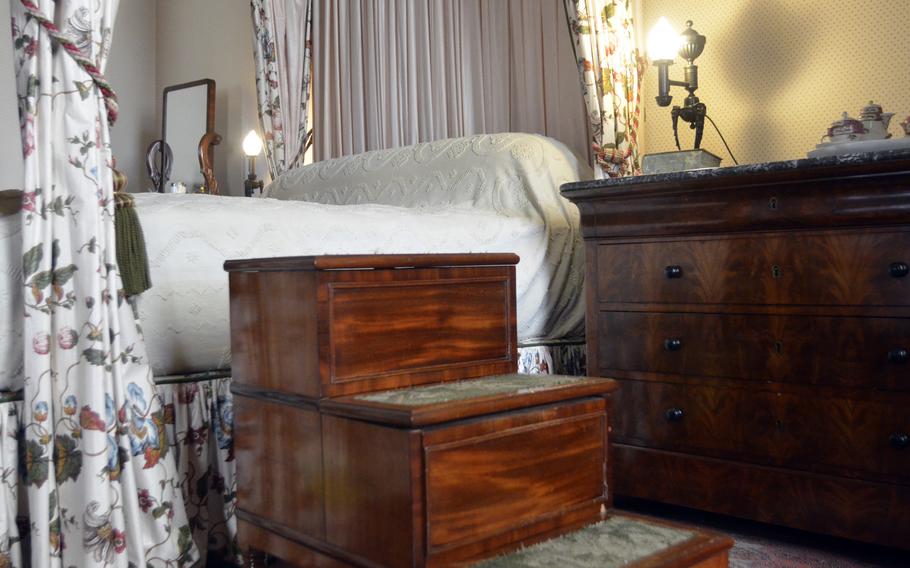 The Lord and Lady Bristol's bedroom inside the Ickworth House in Horringer, England. The stairs leading to the bed doubled as a commode.
