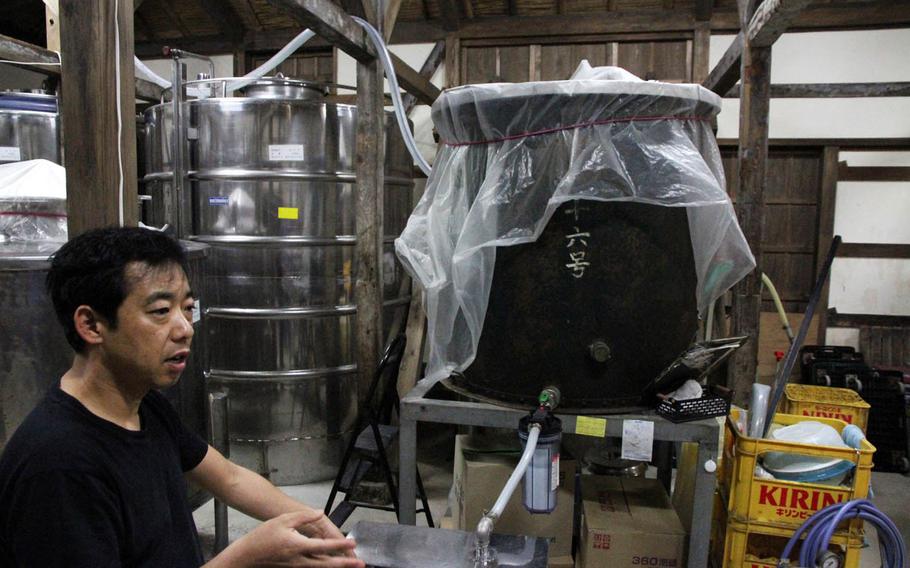Hidekazu Akimura, one of two brewers at Tsukayama Distillery -- the only Okinawan awamori distillery to survive the Battle of Okinawa -- explains the process of making top-quality awamori.