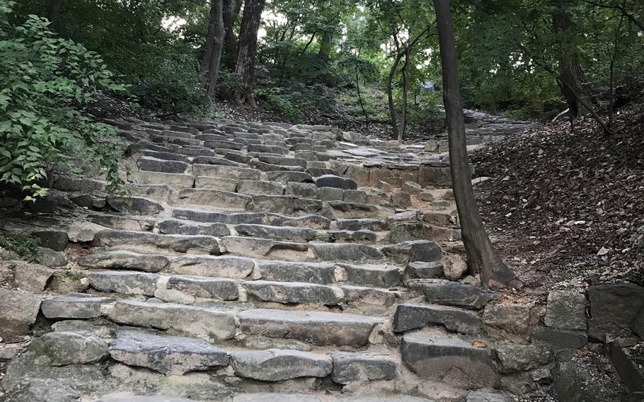 Stone steps that blend into nature illustrate the harmony that distinguishes the Secret Garden, a former royal retreat behind the Changdeokgung Palace in Seoul during a tour on Sunday, Oct. 8, 2017.