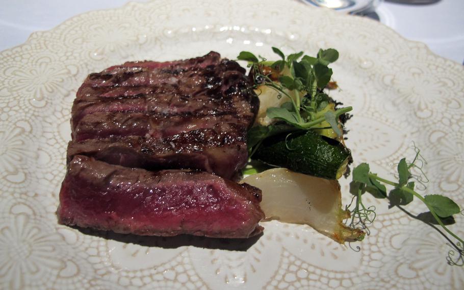 Not all the dishes at El Coq are strange. A steak, from trendy Spanish cattle renown for extra beefiness, is a mainstay of the restaurant's five-course tasting menu.