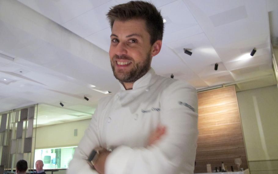 El Coq chef Lorenzo Cogo often steps out of the kitchen to talk with diners. Cogo is one of the most innovative young chefs in Italy, according to the Michelin guide.