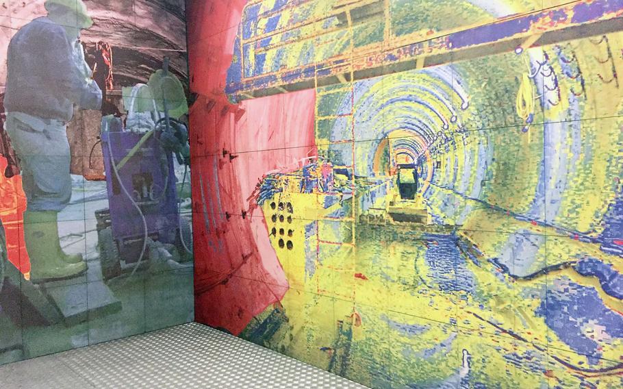 A mural depicting a worker near a subway tunnel can be found in an alcove at the Toledo Metro Station in Naples, Italy. The city's subway stations are emblazoned with striking artwork.