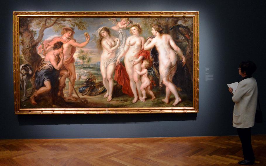 A visitor to the exhibit ''Rubens: The Power of Transformation'' at the Staedel Museum in Frankfurt, Germany looks at one of master's versions of '' The Judgement of Paris'' on display. Painted around 1639, it is on loan from the Prado in Madrid for the show.