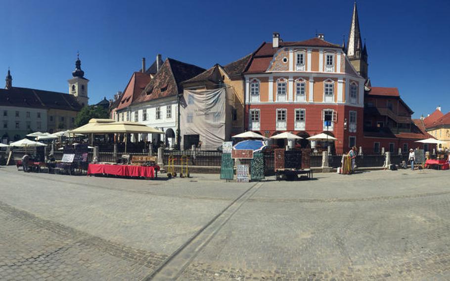 An iPhone panorama of Sibiu, Romania's Piata Mica, or Little Square with its historic old buildings..