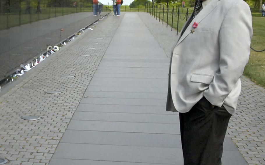 Antonio Martinez at the Vietnam Veterans Memorial.