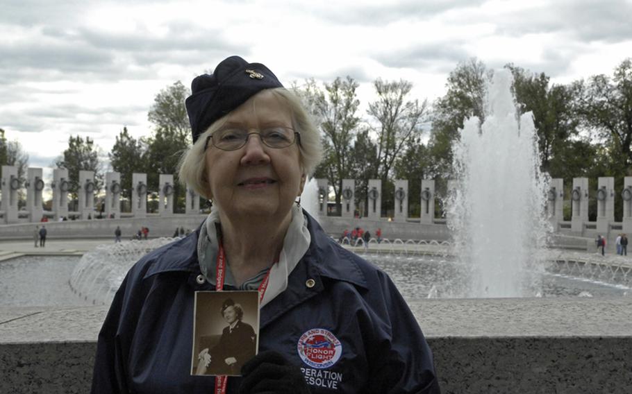 Navy sailor Doris Zimmermann with the Stars and stripes Honor Flight. 