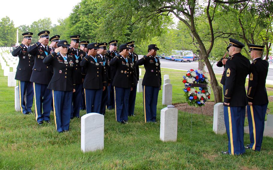 The Military District of Washington Sergeant Audie Murphy Club salute in honor of Audie Murphy during the 2013 annual wreath laying ceremony celebrated on his birthday, June 20th, at Audie Murphy's grave site in Arlington National Cemetery. 
