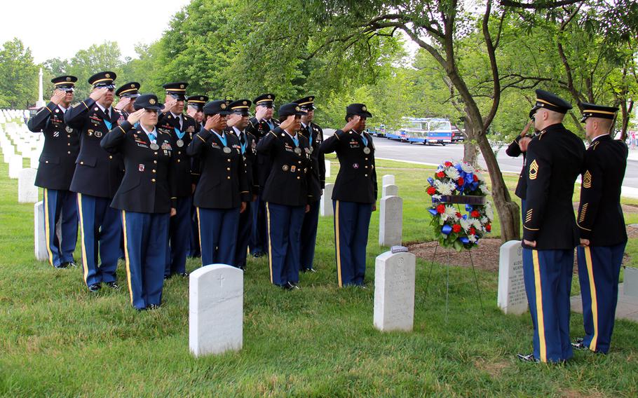 The Military District of Washington Sergeant Audie Murphy Club salute in honor of Audie Murphy during the 2013 annual wreath laying ceremony celebrated on his birthday, June 20th, at Audie Murphy's grave site in Arlington National Cemetery. 
