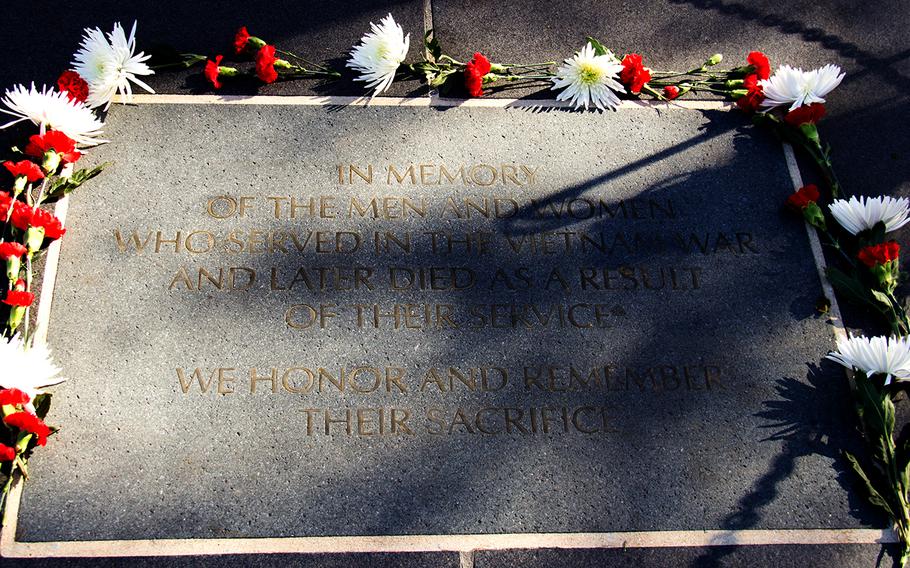 In honor of those who served and later died as a result of their service memorial at the The Three Soldiers statue on Veterans Day 2013 in Washington, D.C.