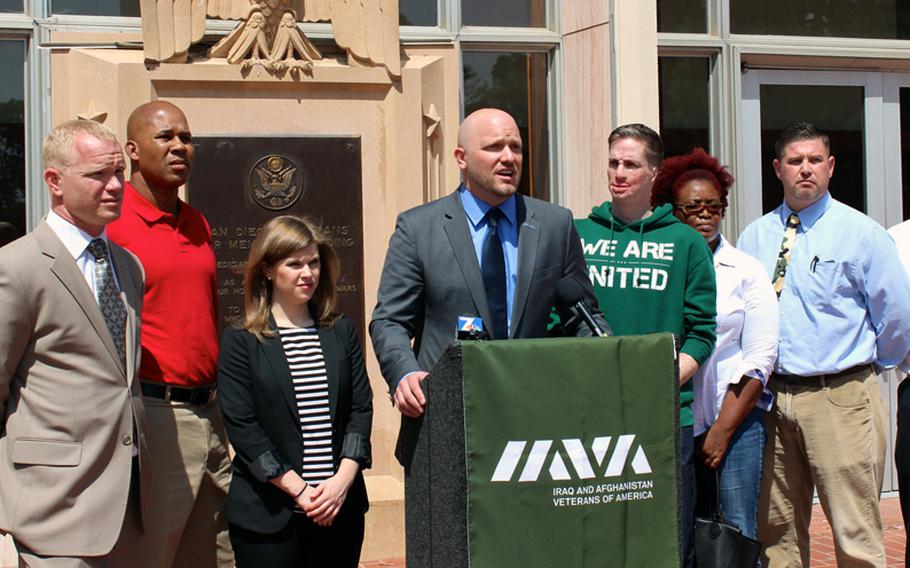 At a gathering in front of the War Memorial building in San Diego on Thursday, May 8, 2014, Paul Rieckhoff, executive director and founder of Iraq and Afghanistan Veterans of America, calls for President Barack Obama to address allegations of coverups and mismanagement at Arizona, Texas and Colorado Veterans Affairs facilities.