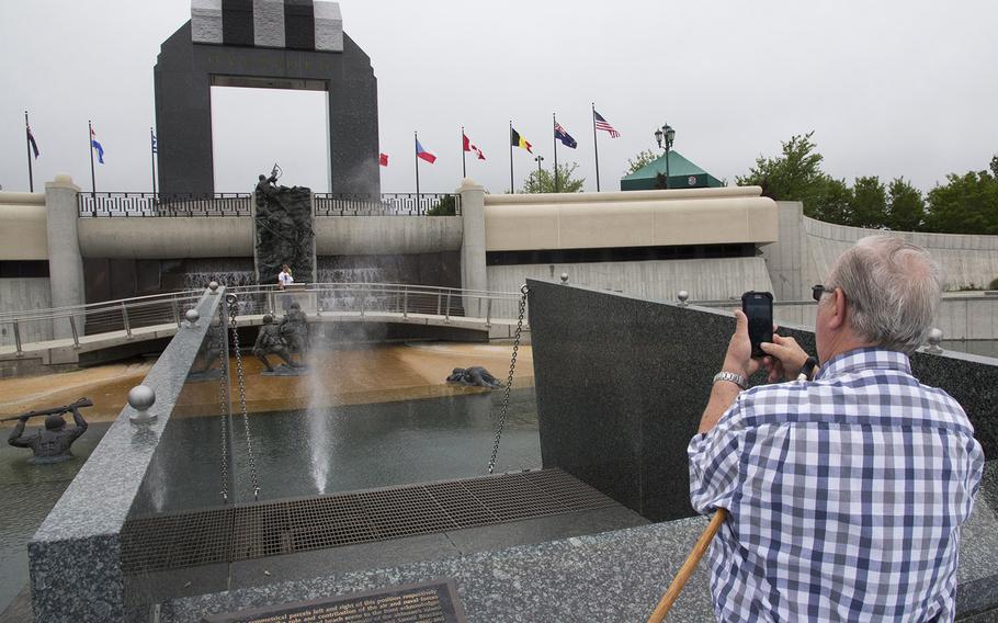 In "Across the Beach" at the National D-Day Memorial in Bedford, Va., jets of water represent bullets hitting the water during the assault on Normandy on June 6, 1944.