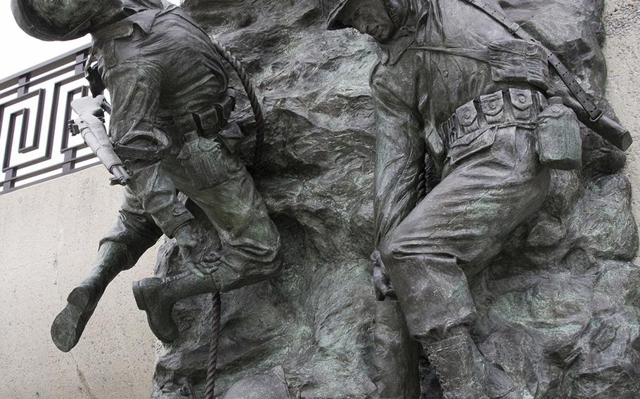 "Scaling the Wall," a tribute to the 2nd Ranger Battalion's assault on Pointe du Hoc during the D-Day invasion, at the National D-Day Memorial at Bedford, Va.