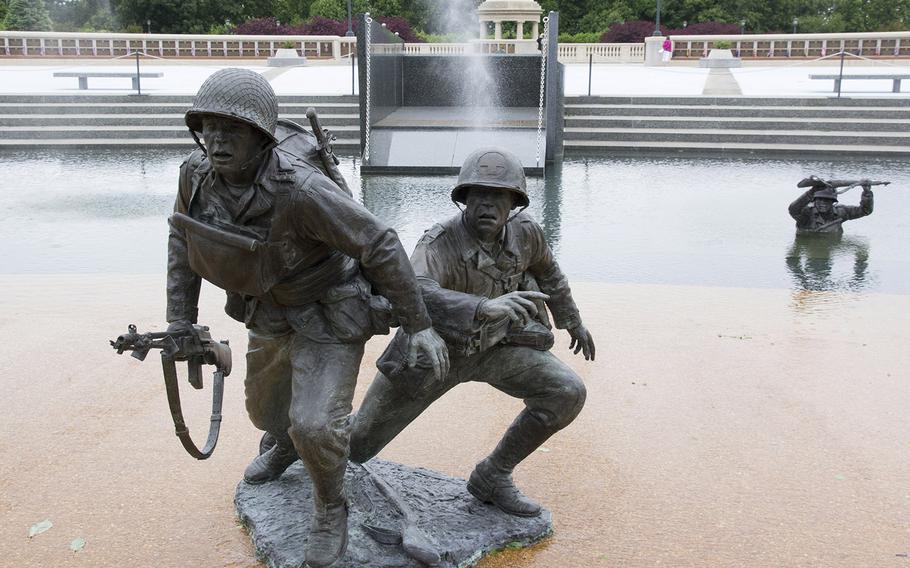 In "Across the Beach" at the National D-Day Memorial in Bedford, Va., jets of water represent bullets hitting the water during the assault on Normandy on June 6, 1944.