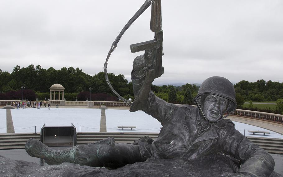 The top of Jim Brothers' sculpture, "Scaling the Wall," at the National D-Day Memorial in Bedford, Va. In the background is Elmon T. Gray Plaza.