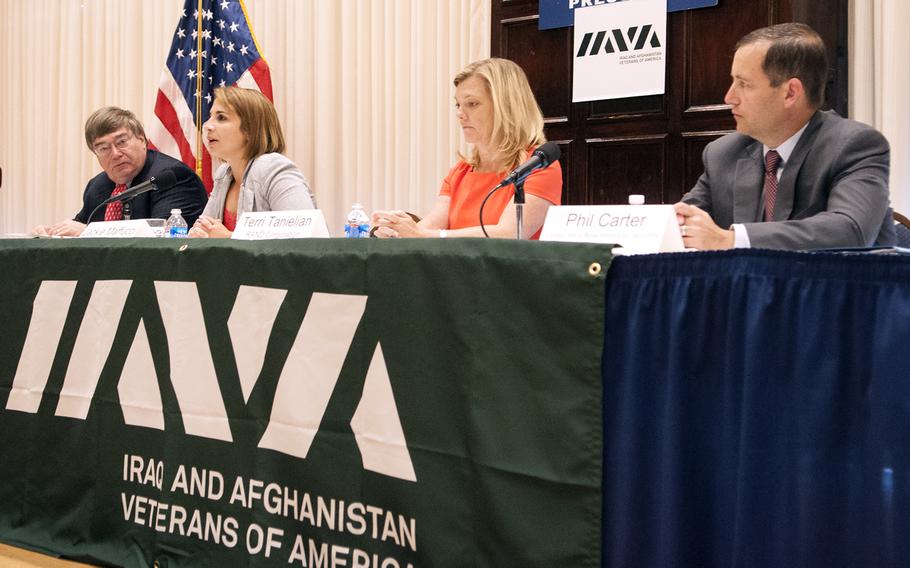 From left to right, Charlie Cook, Jackie Maffucci, Terri Tanielian, and Phillip Carter participate in a panel discussion of the IAVA survey results released during a press conference on July 14, 2014, at the National Press Club in Washington, D.C.