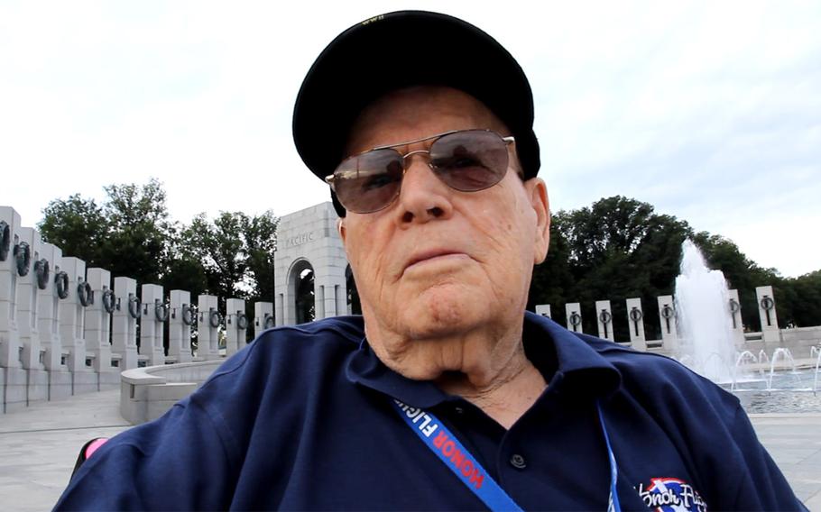 Jack Tomlinson, who flew the P-51 Mustang in the Pacific during World War II, visits the National World War II Memorial as part of the Honor Flight of Idaho program on Sept. 3, 2014.