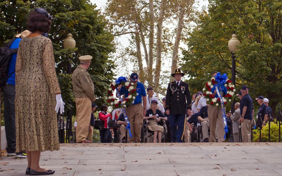 The first half of the Texas Honor Flight prepare to enter the World War II Memorial on October 1, 2014. For most of the veterans on the trip, this was their first time seeing the memorial. 
