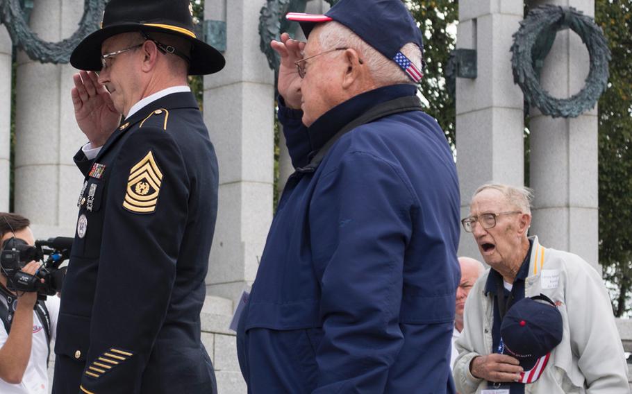 Participants of the Texas honor flight salute at the World War II Memorial in Washington, D.C., on Oct. 1, 2014.