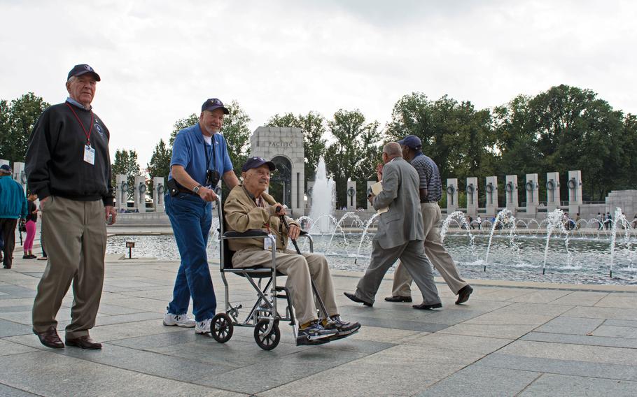 Robert Martin, a WWII veteran who fought under Gen. Douglas McArthur and was deployed to New Guinea, Philippines and Japan, visits the World War II Memorial in Washington, D.C., on Oct. 1, 2014.