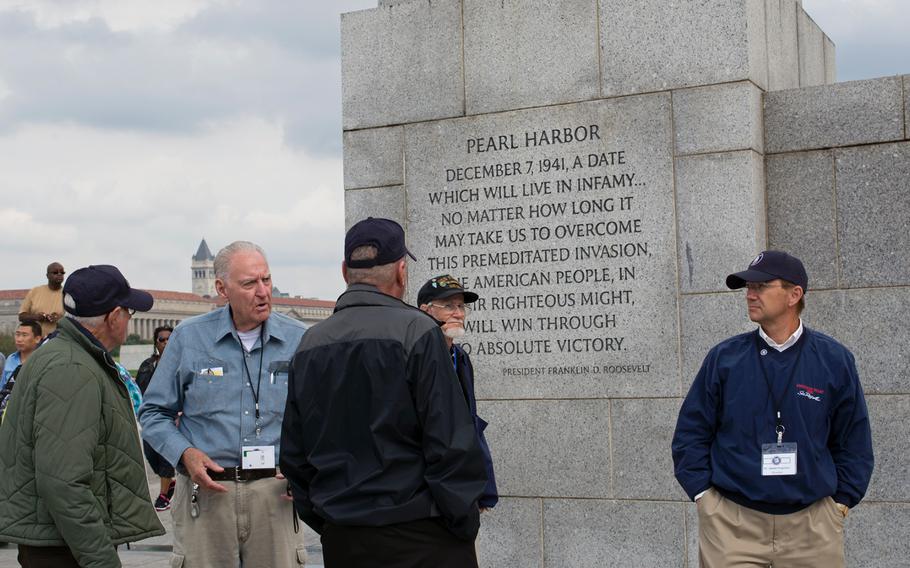 Honor flight participants inside the World War II Memorial on Oct. 1, 2014.