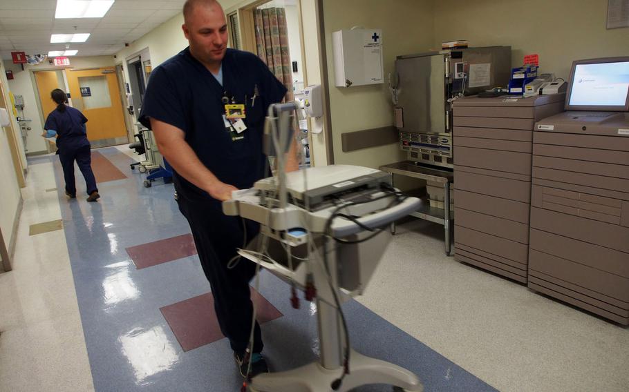 Former Army combat medic Joe Carney is working as an intermediate care technician at the James Lovell Federal Health Care Center in North Chicago. The position was created by the Department of Veterans Affairs to help former medics and Navy  corpsmen find employment and help VA fill a shortage of healthcare professionals.