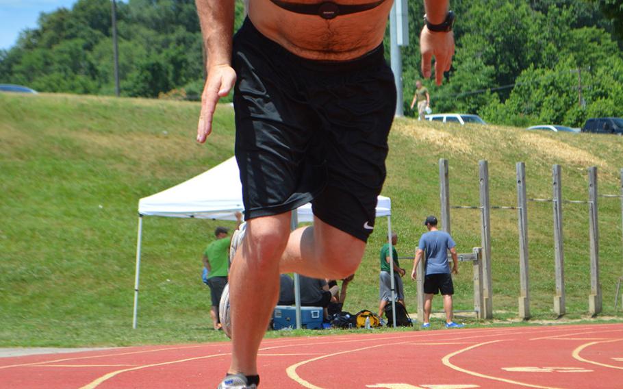 Retired Air Force Sr. Airman Kendell Madden, 31, takes off from a starting position for the camera June 18, 2015, during training a day before the Warrior Games kicks off at Quantico in Virginia.