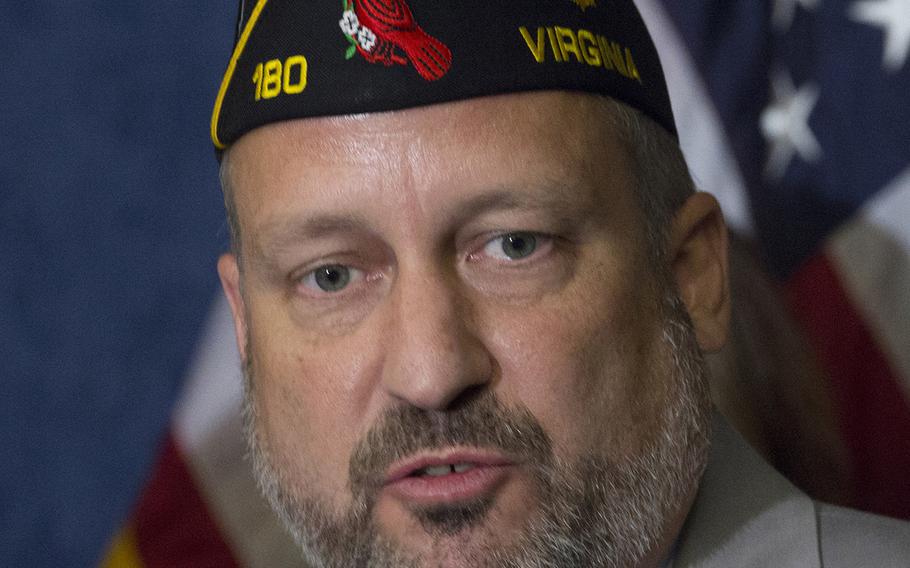 Ian de Planque, the American Legion's legislative director, answers a question during a press conference about the Jason Simcakoski Memorial Opioid Safety Act at the U.S. Capitol, June 24, 2015.