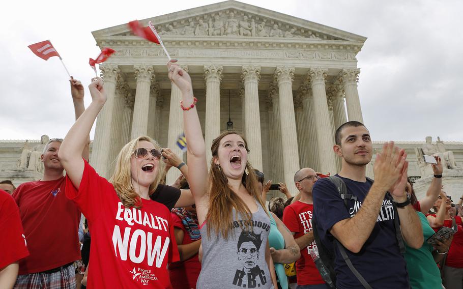 Supporters of gay marriage celebrate outside the Supreme Court on June 26, 2015 in Washington, D.C. The U.S. Supreme Court struck down bans on same-sex marriage in a historic 5-4 ruling. 