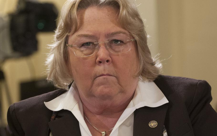 VA Deputy Inspector General Linda Halliday listens during a House Veterans Affairs Committee hearing on alleged misuse of the VA relocation program, Nov. 2, 2015, on Capitol Hill.