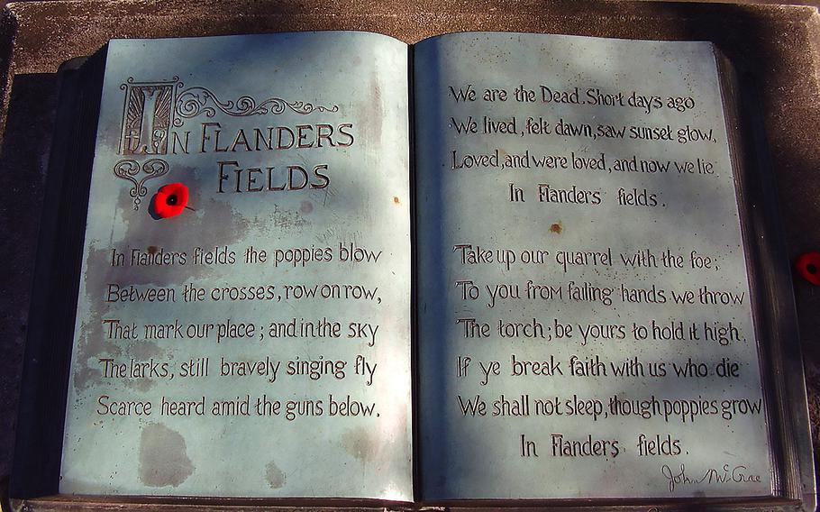 Inscription of the complete poem in a bronze "book" at the John McCrae memorial at his birthplace in Guelph, Ontario, Canada.