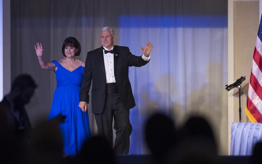 Vice President Mike Pence and his wife Karen take the stage around midnight during the Veterans Inaugural Ball: Salute to Heroes on Jan. 20, 2017.