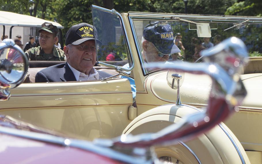 Rex Maddox, a WWII veteran, waits for the start of the Memorial Day Parade in Washington, D.C., May 29, 2017. He was in one of several cars that carried WWII veterans through the parade. 