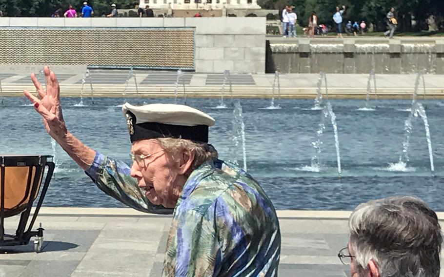 Geraldine Lohman Corn waves to the crowd at the commemoration of the 73rd anniversary of D-Day. Corn was a Navy nurse on the home front, caring for wounded back from duty in the Pacific. 