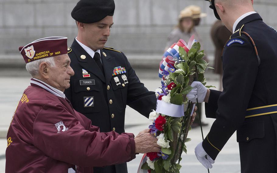 World War II veteran Harold Radish places a wreath at the National World War II Memorial during a Memorial Day ceremony on May 29, 2017.

