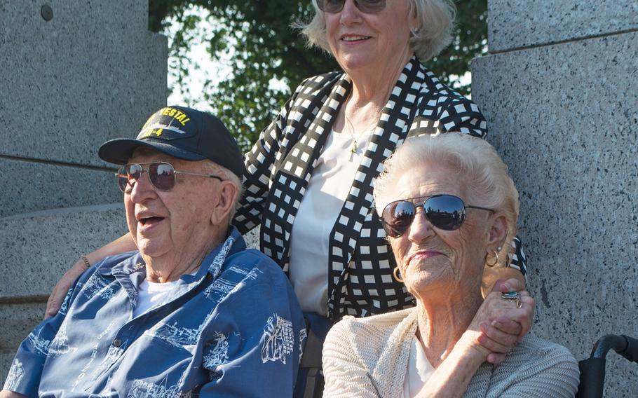 USS Arizona survivor Lauren Bruner and Velma Stratton visit the World War II Memorial in Washington, D.C., on July 20, 2017. Behind them is the daughter of Joe George, Joe Ann Taylor. George is responsible for saving Burner and Donald Stratton as the USS Arizona burned. 