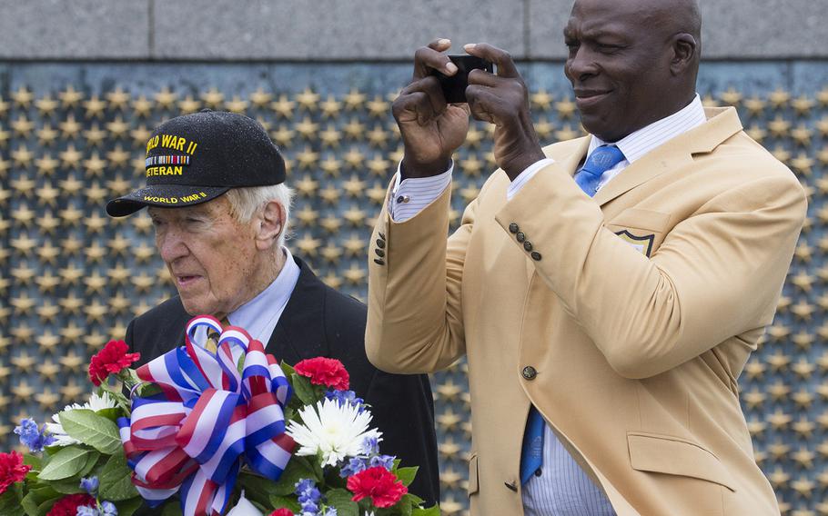 Pro Football Hall of Famers Coach Marv Levy and Bruce Smith, at a ceremony marking the 72nd anniversary of V-J Day, September 2, 2017 at the National World War II Memorial in Washington, D.C.