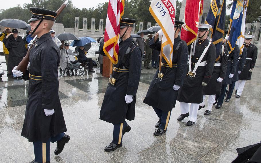 Members of the U.S. Armed Forces Color Guard, at a ceremony marking the 72nd anniversary of V-J Day, September 2, 2017 at the National World War II Memorial in Washington, D.C.