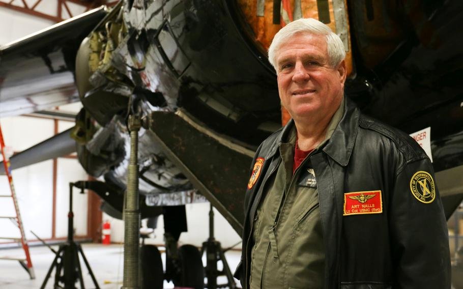Art Nalls, a retired Marine Corps test pilot, poses in front of his L-39C Albatros jet.