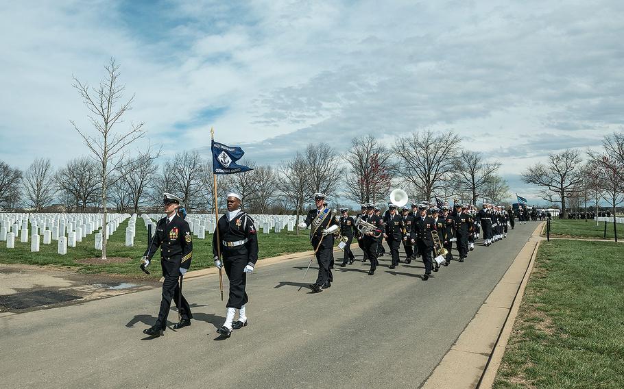 The U.S. Navy Ceremonial Guard, The U.S. Navy Band, and The 3d U.S. Infantry Regiment (The Old Guard) Caisson Platoon participate in the full honors funeral of U.S. Navy Capt. Thomas J. Hudner in Section 54 of Arlington National Cemetery on April 4, 2018.