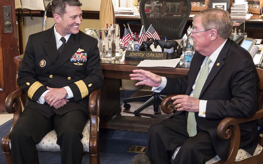 Rear Adm. Ronny Jackson, President Donald Trump's nominee to serve as Secretary of Veterans Affairs, meets with Senate Veterans' Affairs Committee chairman Johnny Isakson, R-Ga., on April 16, 2018.